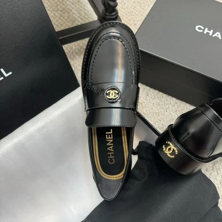 View 2 of Refined Black Leather Loafers with Gold Crest â€“ Luxe Comfort