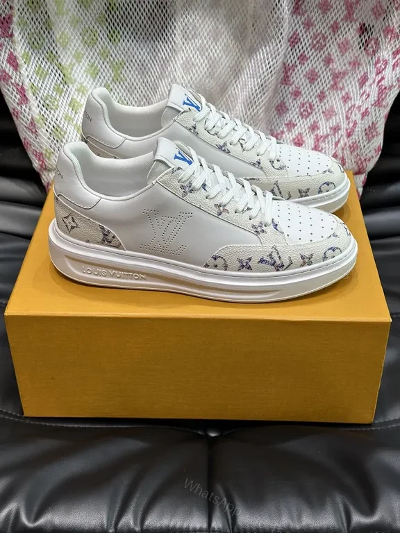 View 8 of Louis Vuitton-Style White Leather Sneakers with Signature Details