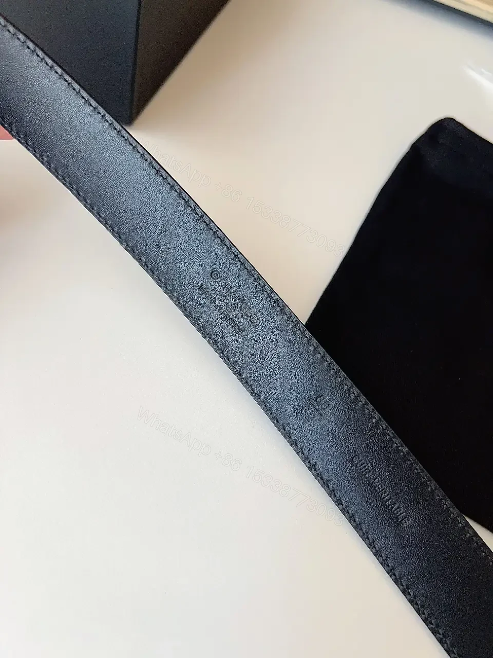 View 4 of Quilted Leather Belt with Signature Buckle - Black - Slim