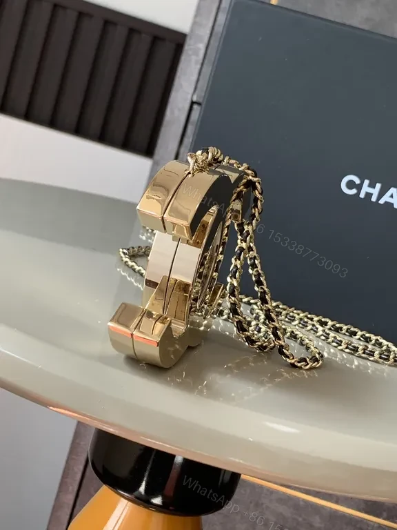 View 2 of Chic Gold Interlocking Logo Bracelet â€” Statement Accessory