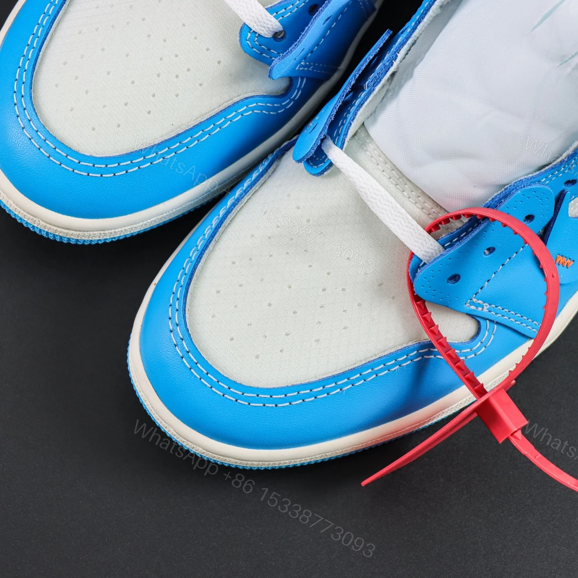 View 5 of Off-White × Air Jordan 1 Retro High OG UNC Reps