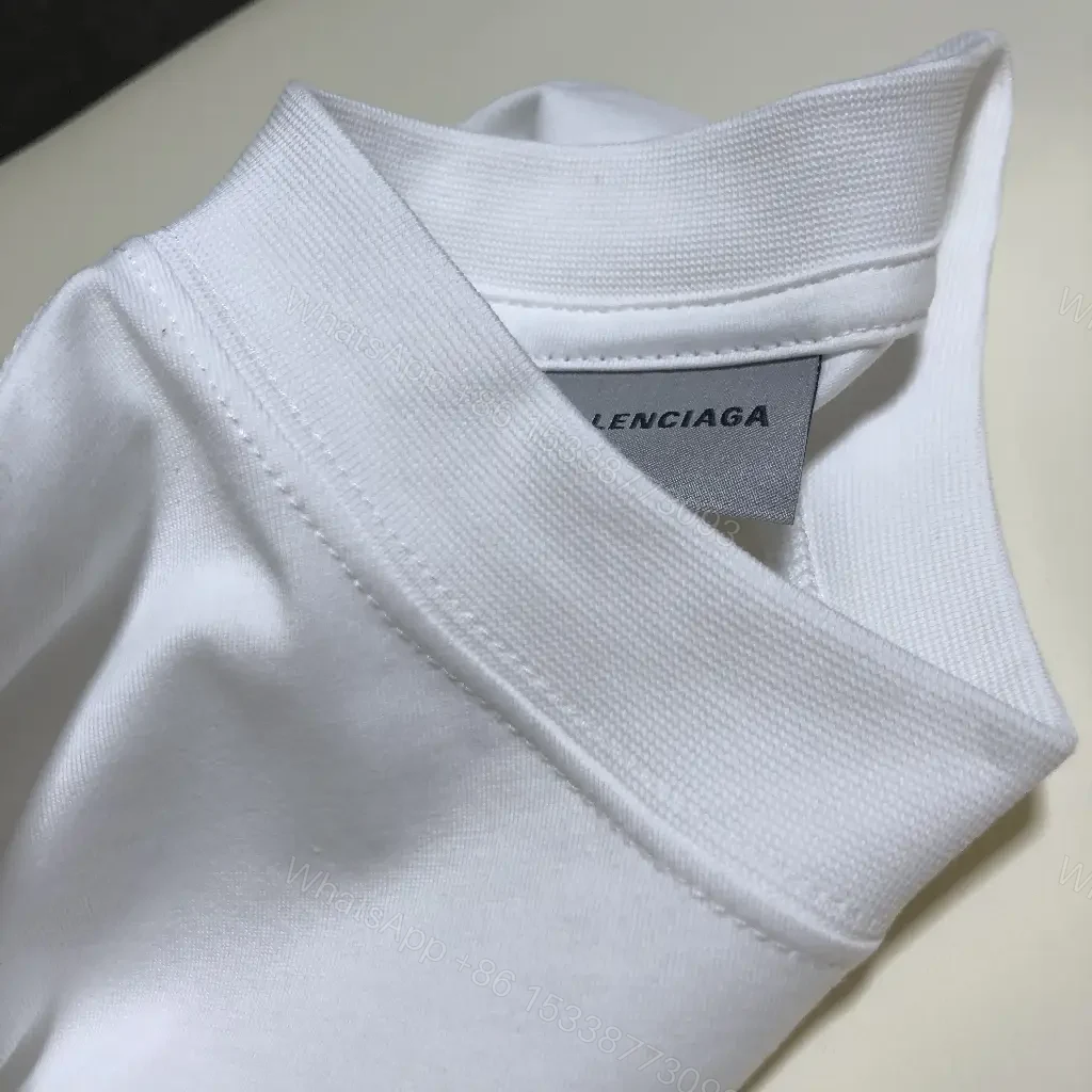 View 4 of white cotton oversized tee with logo motif premium everyday luxury