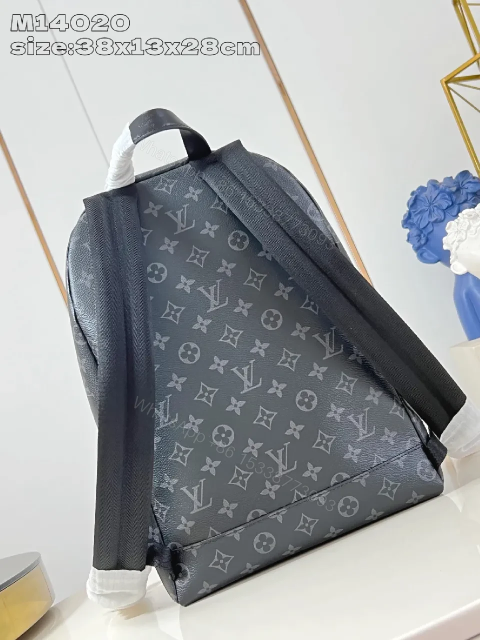 View 3 of Compact Monogram Canvas Backpack: Subtle Luxury, Everyday Utility