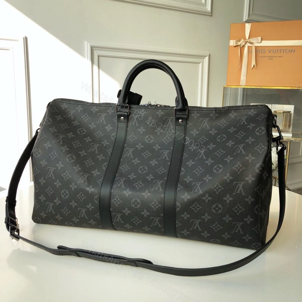 View 2 of Louis Vuitton Keepall Bandouliere 55 Monogram Eclipse Canvas 55cm LV M40605