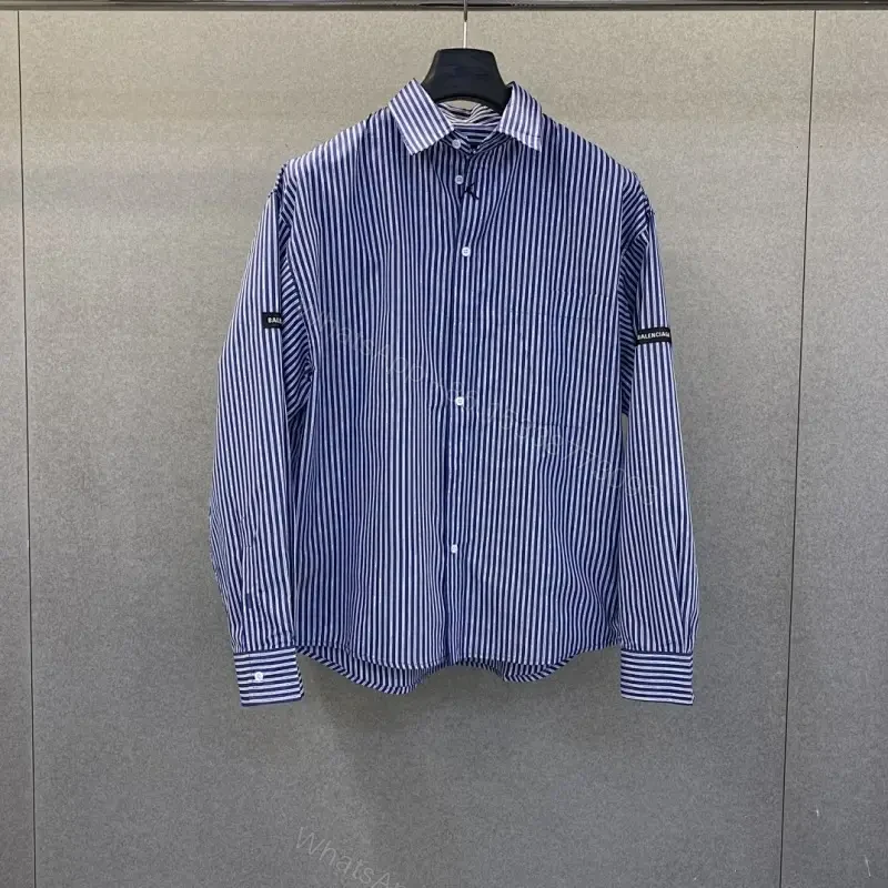 Premium Striped Button-Front Shirt with Subtle Detailing — view 1
