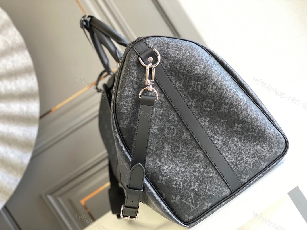 View 6 of SUMMER SET: LOUIS VUITTON KEEPALL BANDOULIÈRE 50 MONOGRAM ECLIPSE & LONG WALLET MONOGRAM ECLIPSE TRUNK ZIPPY BLACK 19CM