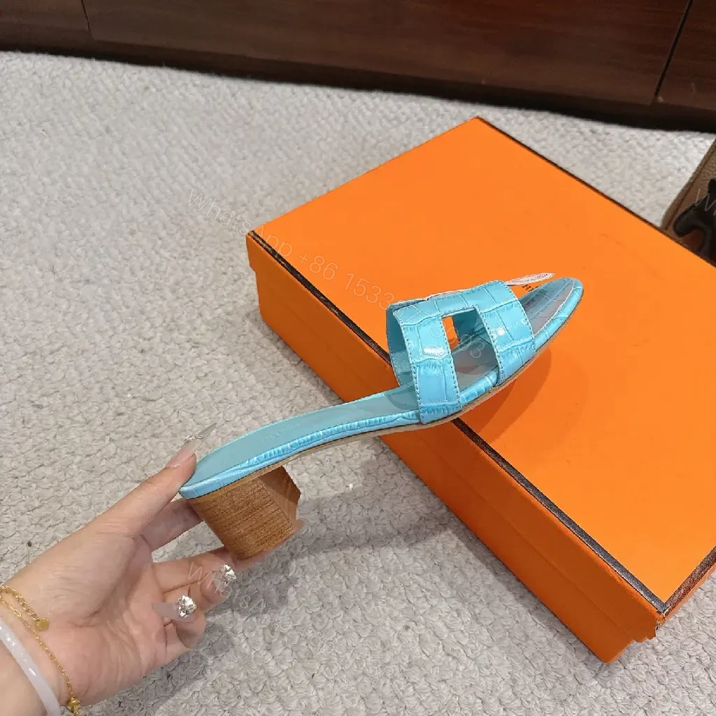 View 9 of Bright Sky Blue Leather Mules with Croc-Texture Strap - Luxury Comfort