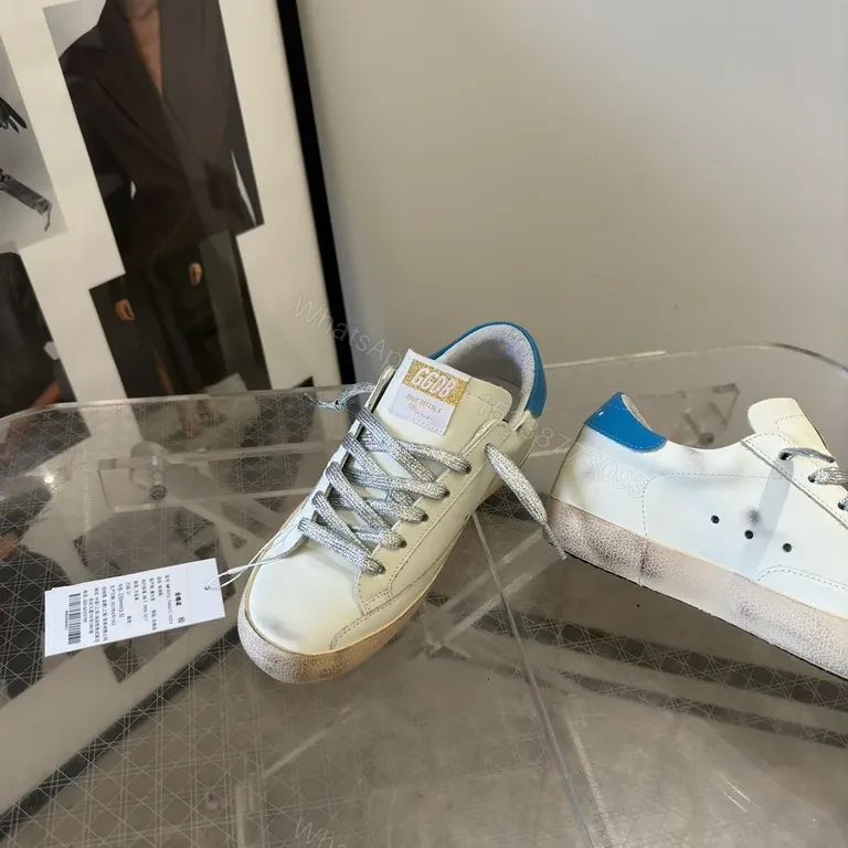 View 8 of Premium Off-White + Leather Sneaker with Blue Heel & Star Details