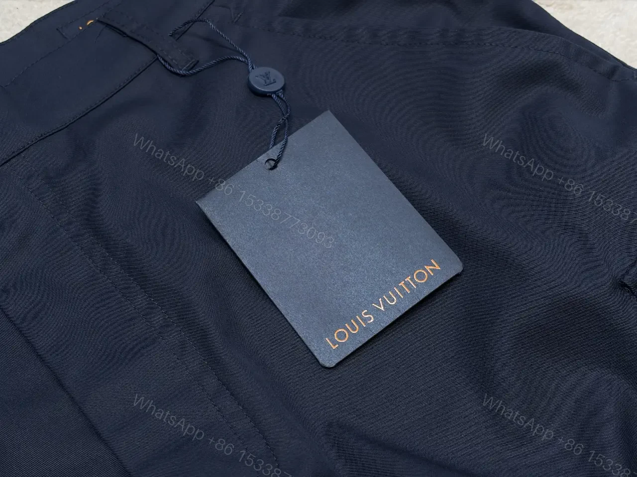 View 5 of Navy Cargo Shorts with Louis Vuitton Logo Embossed Key Features Short