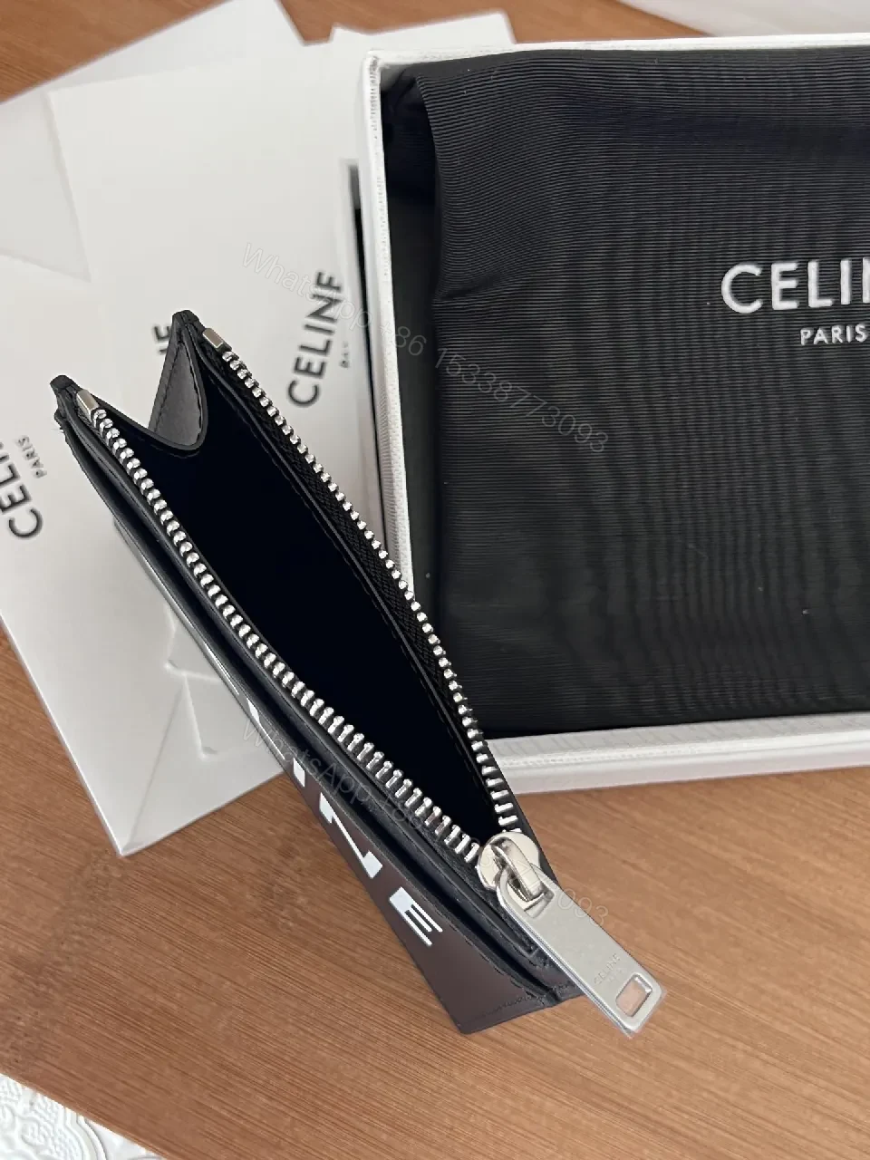 View 6 of Minimalist Black Cardholder: Bold CELINE Print, Compact Luxury