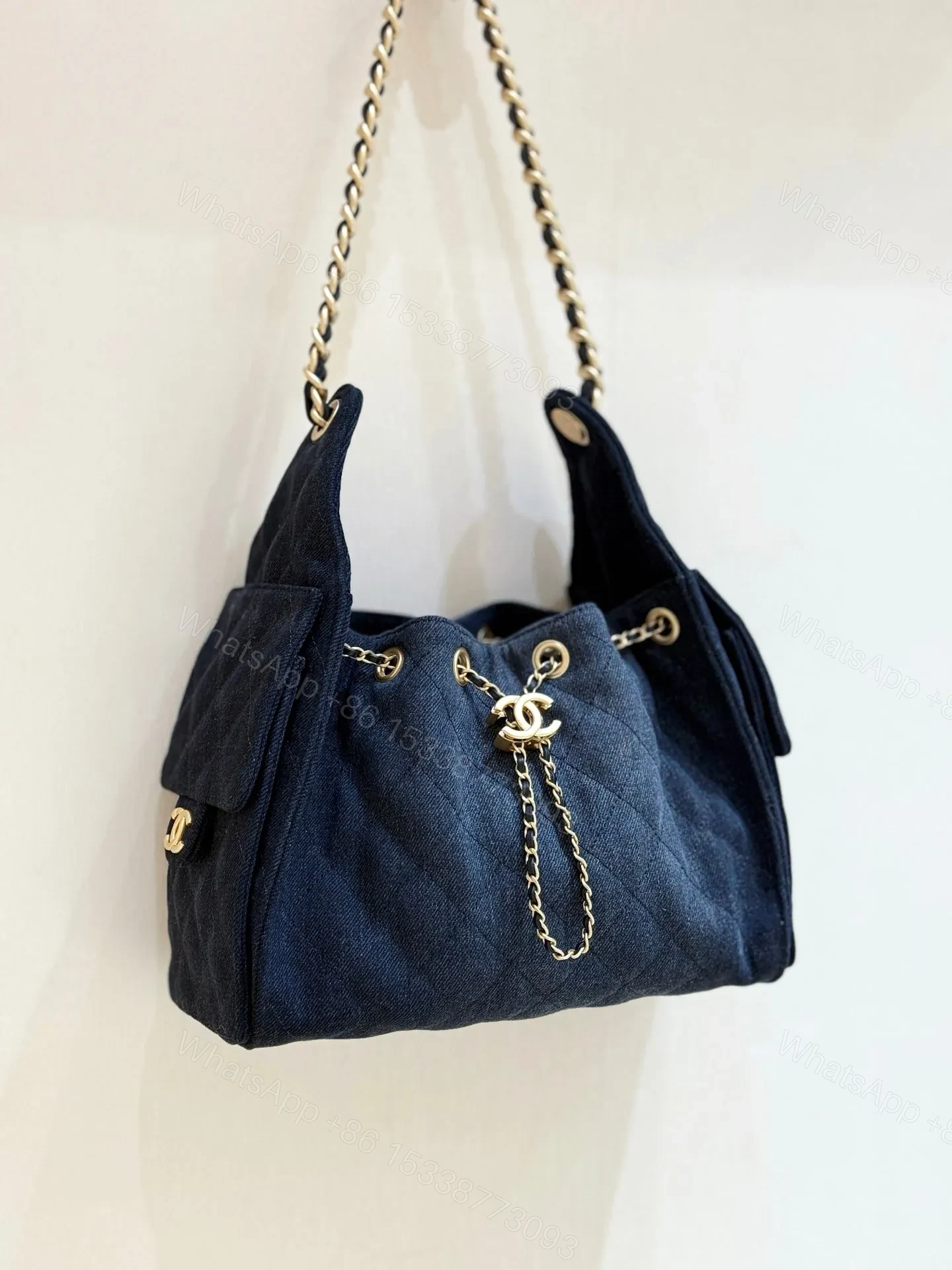 View 2 of CHANEL 25 HANDBAG 30 IN DENIM GOLD HARDWARE