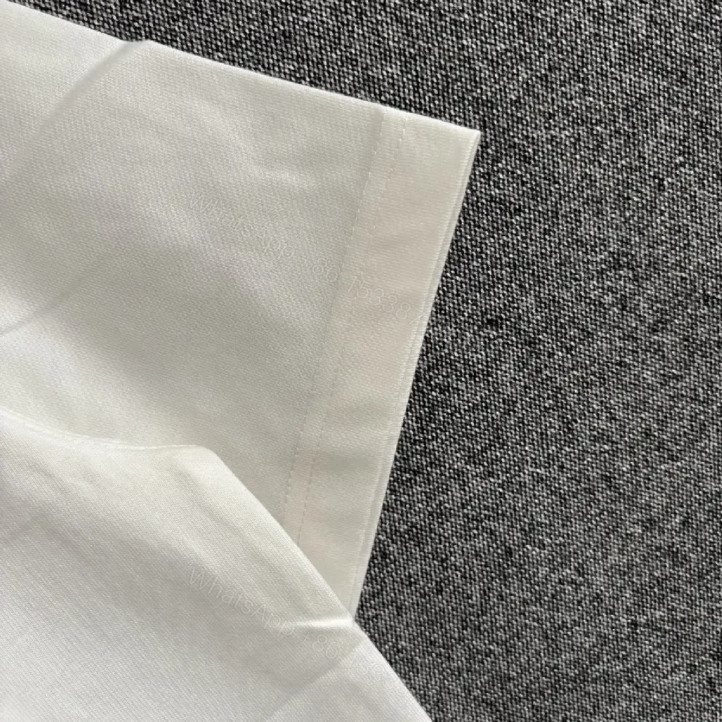 View 6 of Minimalist White Jersey Tee, Premium Comfort, Relaxed Fit, Everyday Style
