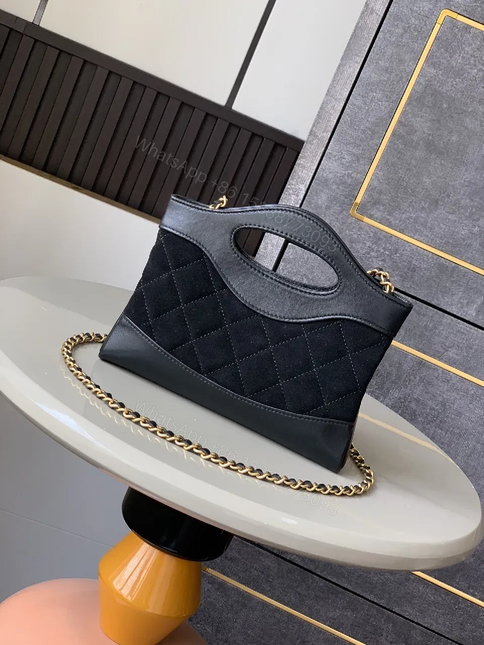 View 2 of Quilted Faux-Leather Handbag with Gold Hardware, Structured Style