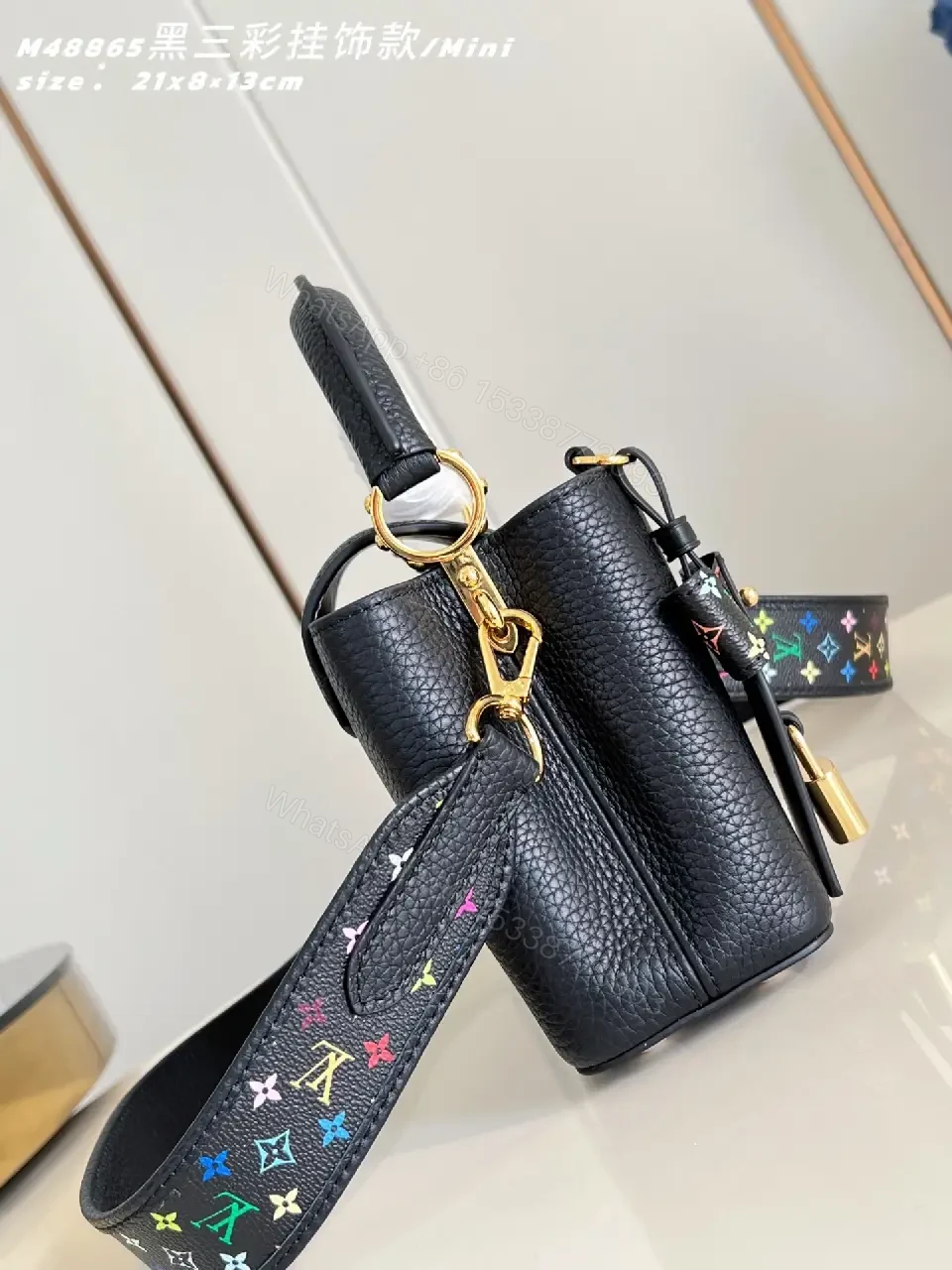View 2 of Mini Black Satchel: Pebbled Leather, Gold Hardware, Bold Accent