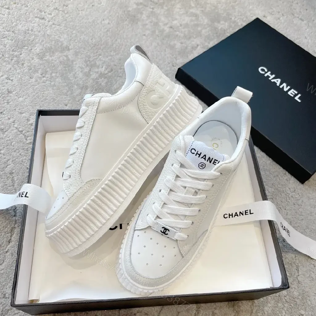 View 7 of Minimalist White Platform Sneakers with Subtle Accents