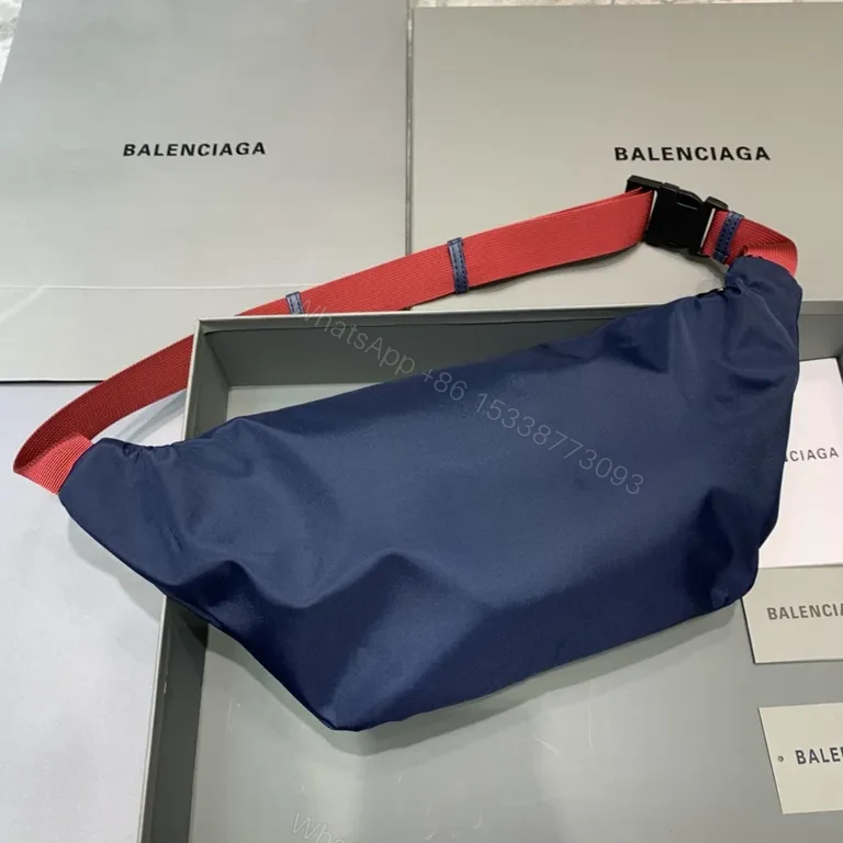 View 3 of Bold Navy Balenciaga Belt Bag with Red Strap - Hands-Free Luxury