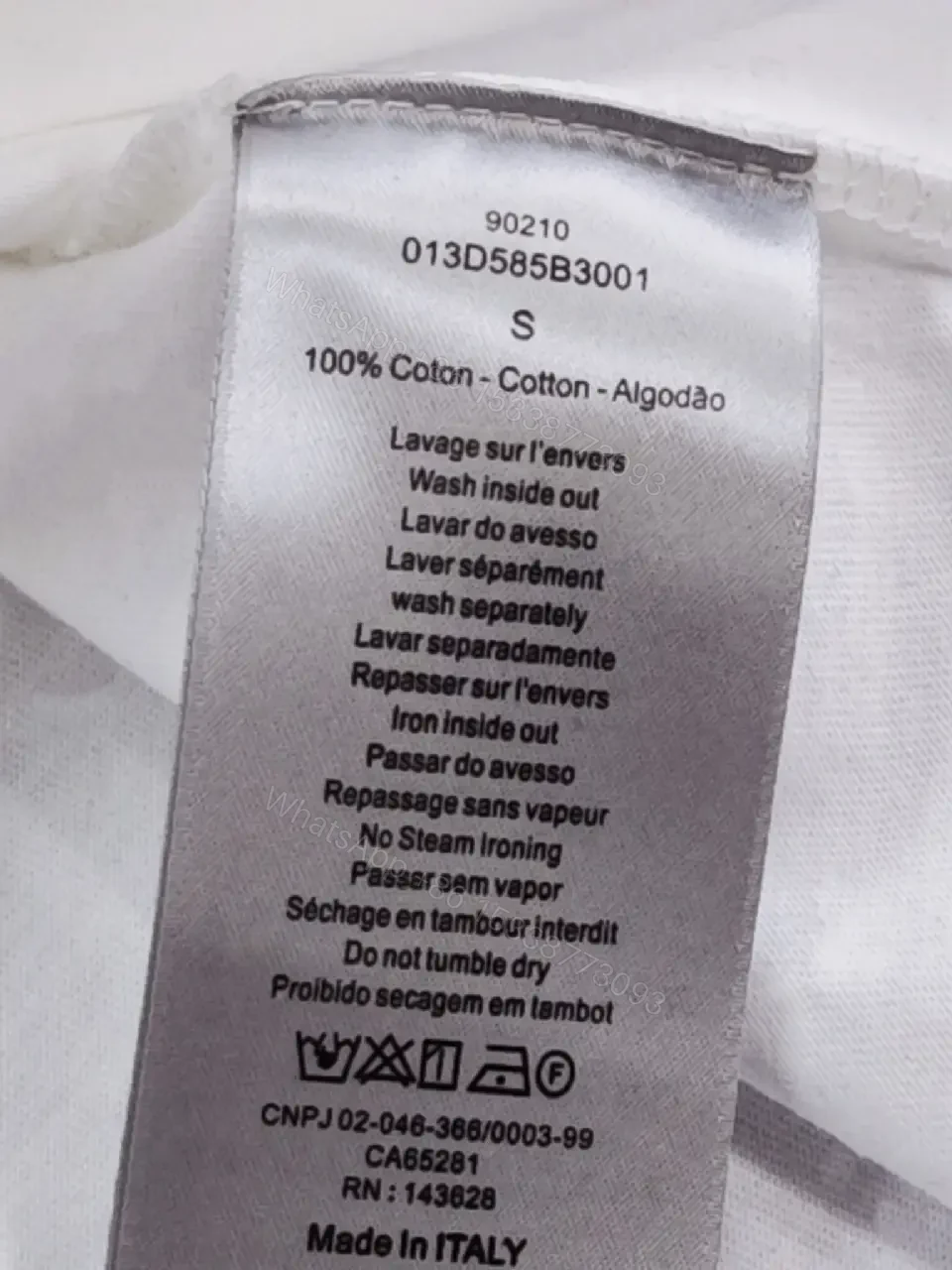 View 5 of Minimalist Luxe Tee: White Cotton, Delicate Embroidery, Everyday Chic