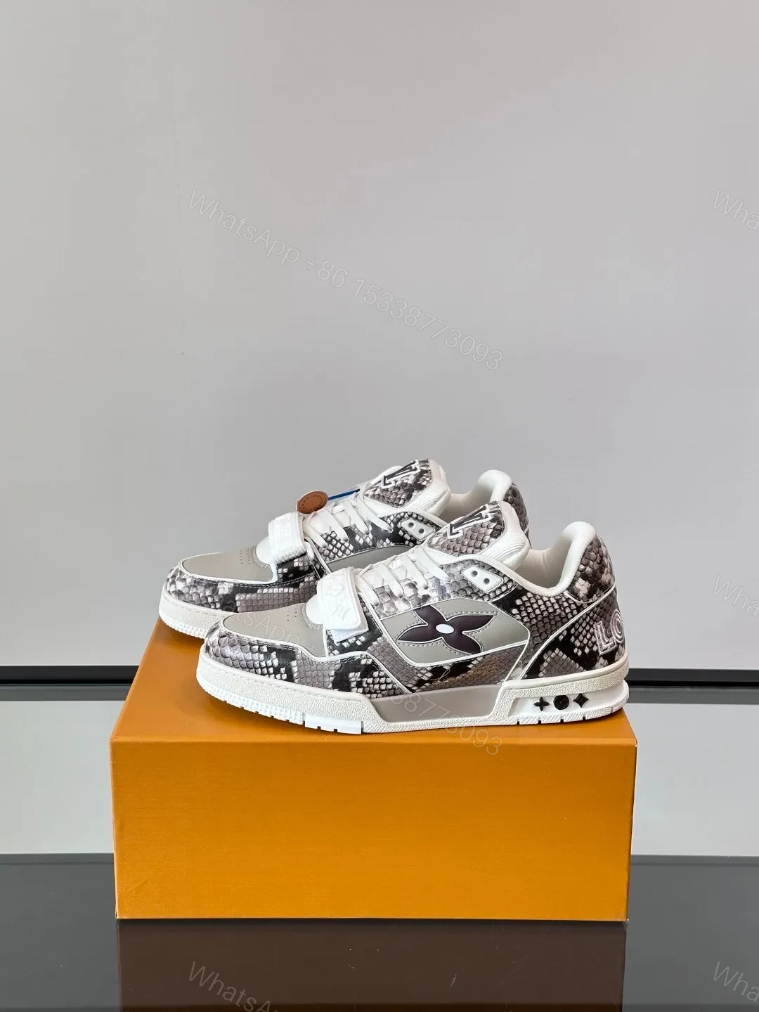 View 3 of LV Men Grey Snake Print Leather Sneakers