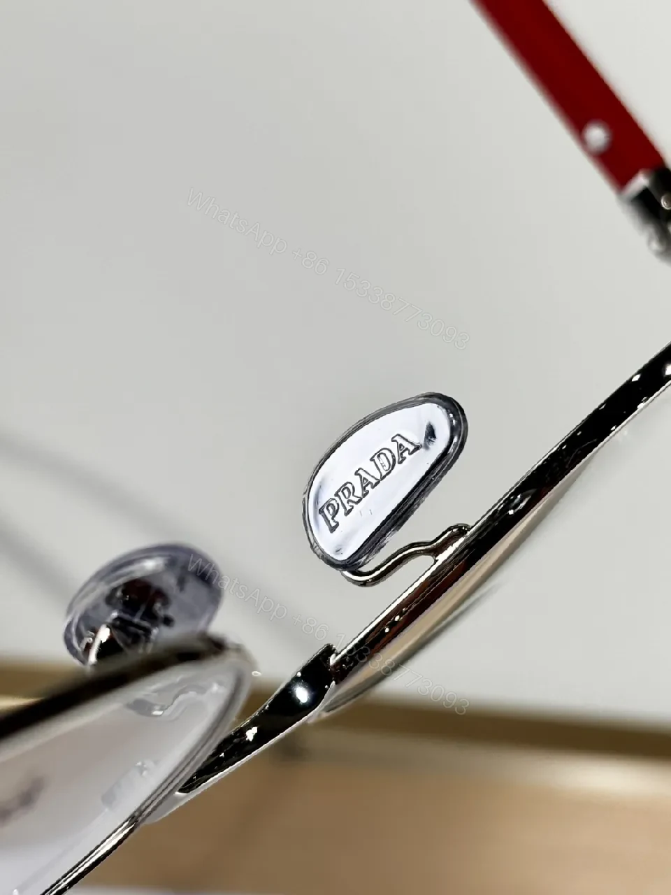 View 2 of Silver Metal Minimalist Precision Eyewear with Red Accents, Luxury Glasses