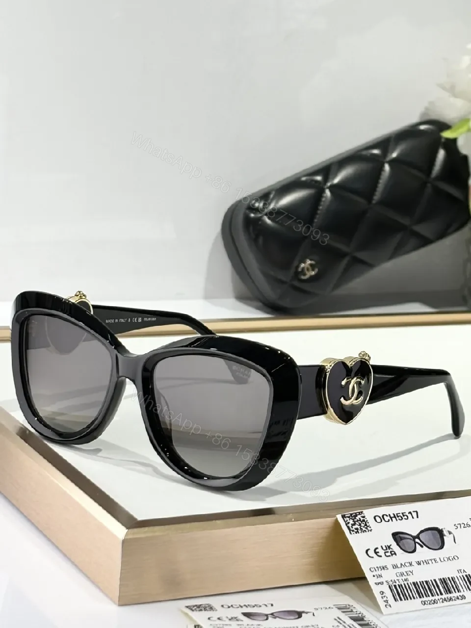 View 9 of Oversized Black Cat-Eye Sunglasses with Subtle Logo Details