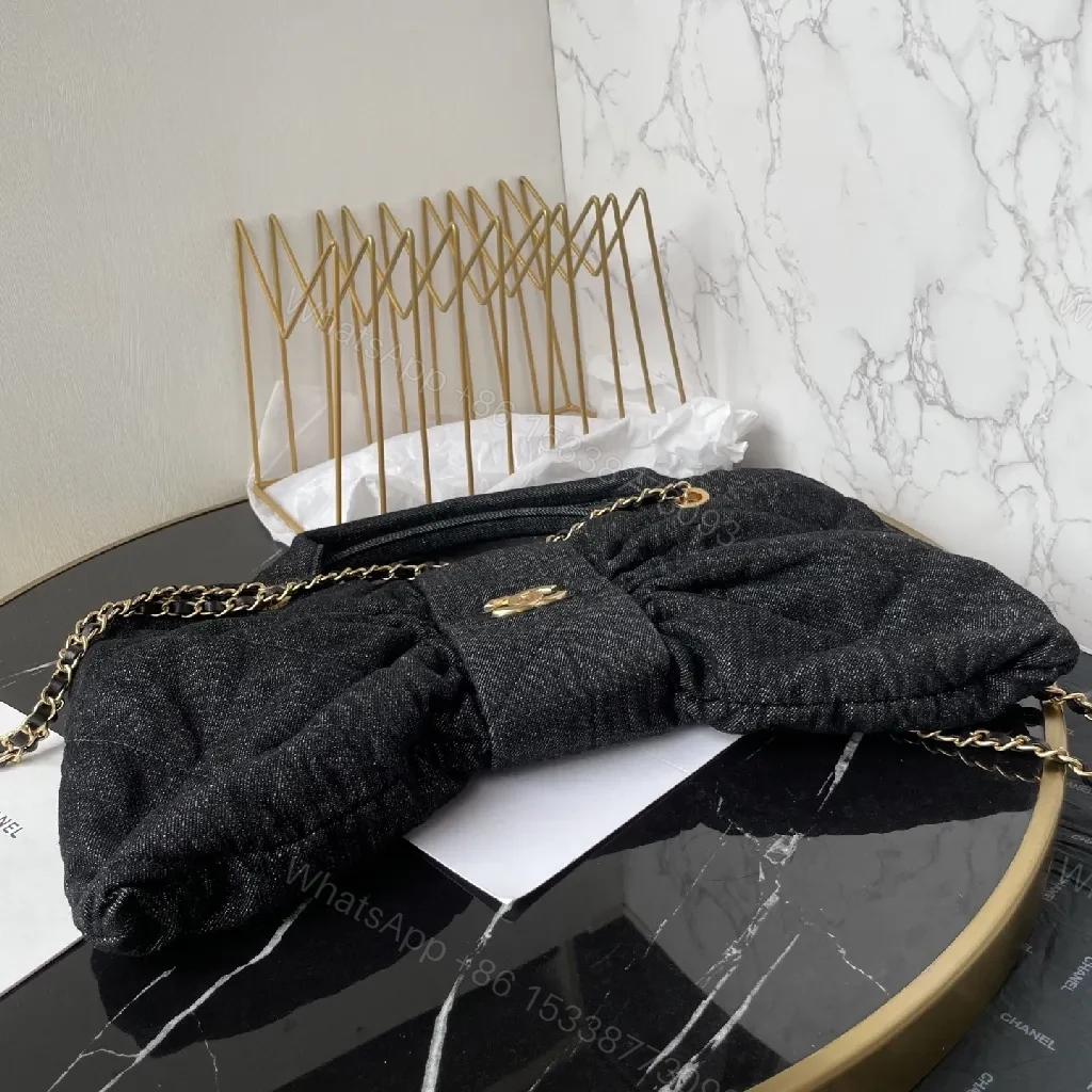 View 8 of Chic Denim Quilt Bag with Gold Hardware