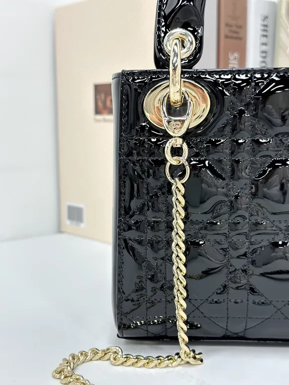 View 9 of Small-Handled Black Patent Bag: Chain Detail & Charms Brand-To-Go