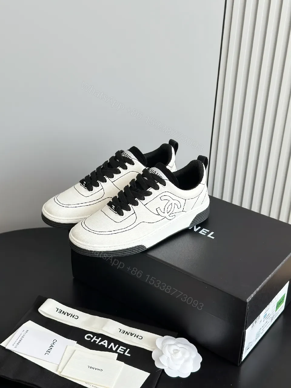 View 7 of Premium White Leather-like Low-Top Sneakers: Sleek, Comfortable, Versatile
