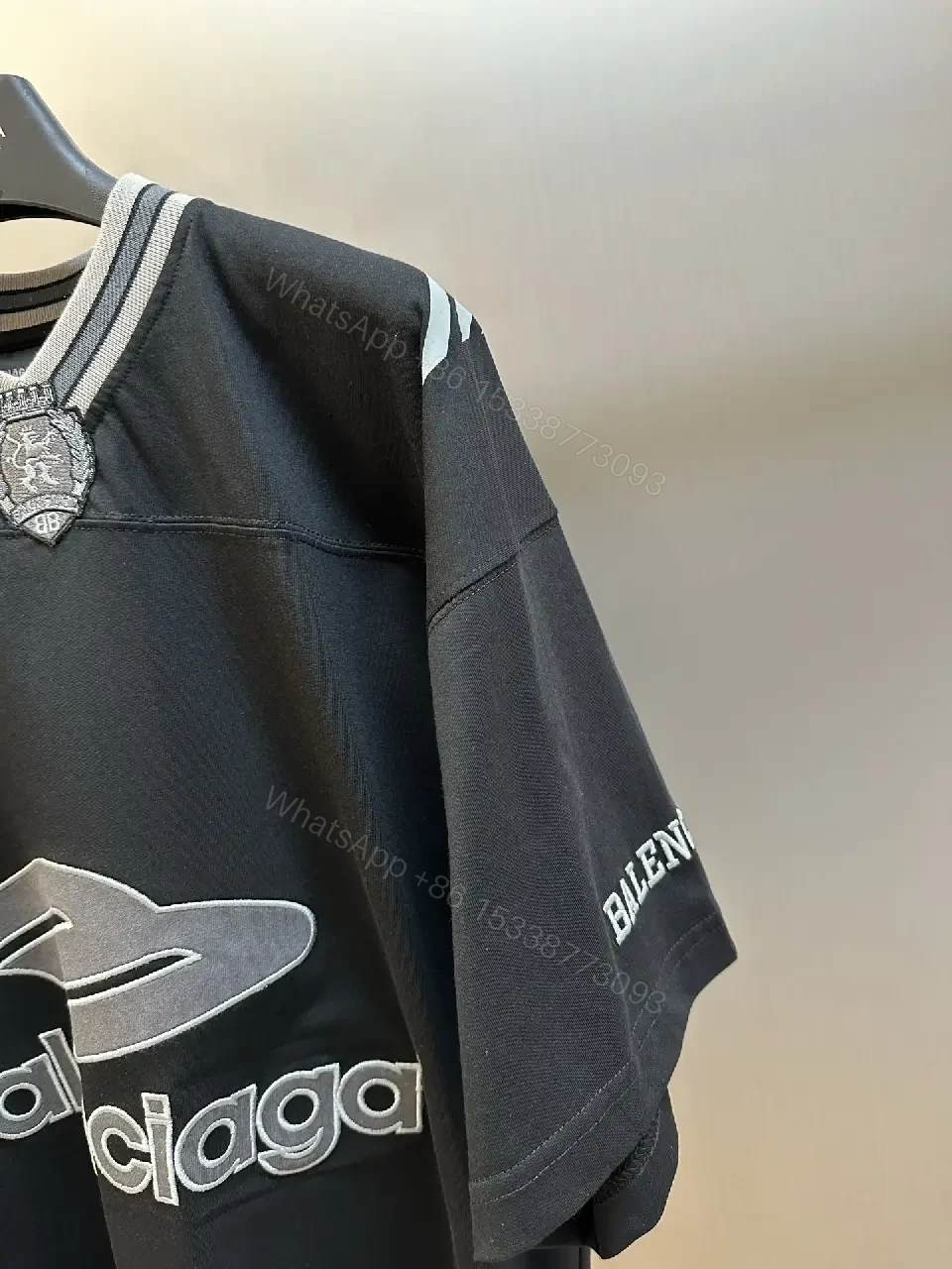 View 5 of Bold Jersey Hybrid Tee: Luxe Detailing, Oversized Logo Statement