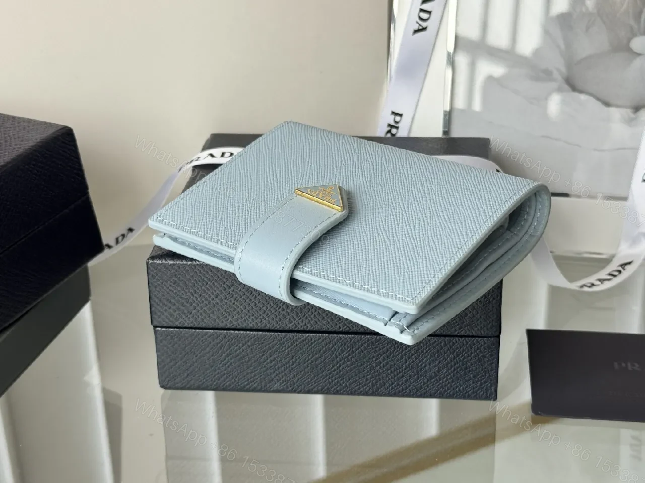 View 12 of Blue Saffiano-Like Bifold Wallet with Triangle Closure, Minimal Luxury