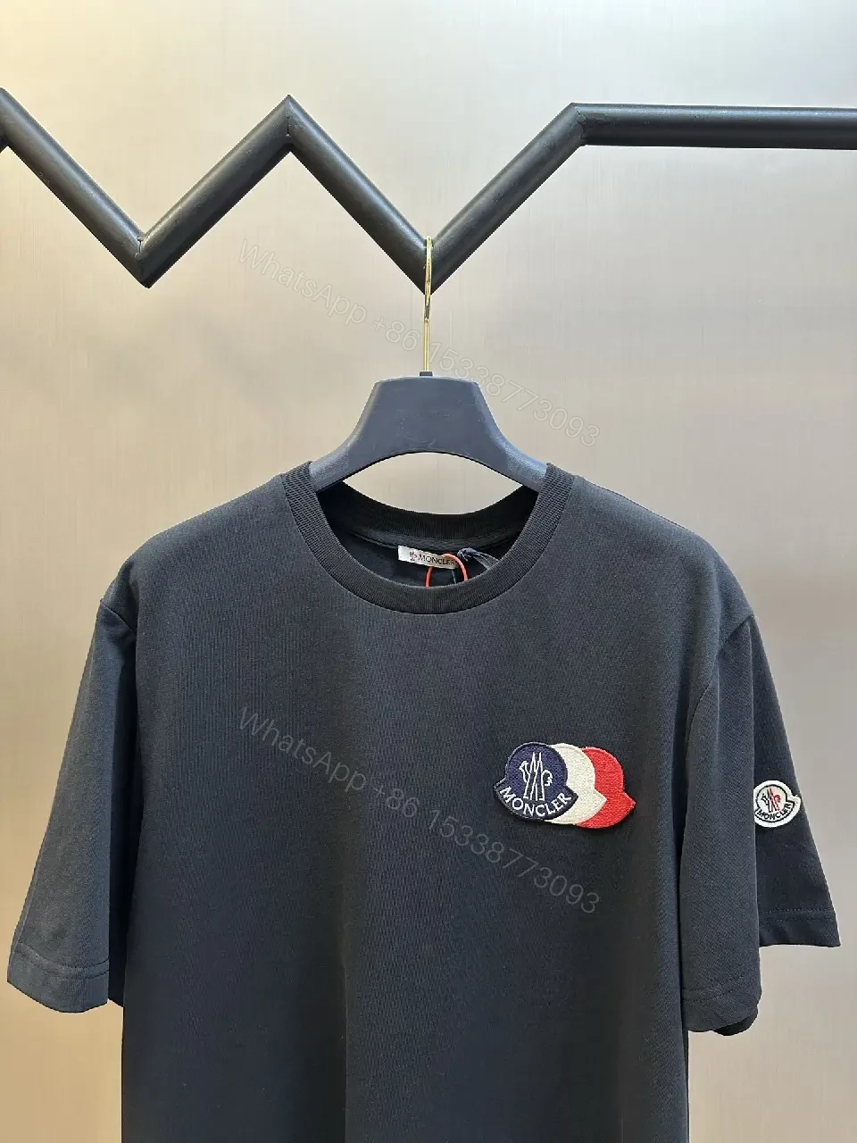 View 9 of Relaxed Luxury Patch Tee - Cotton Blend, Subtle Branding, Casual/Smart-casual