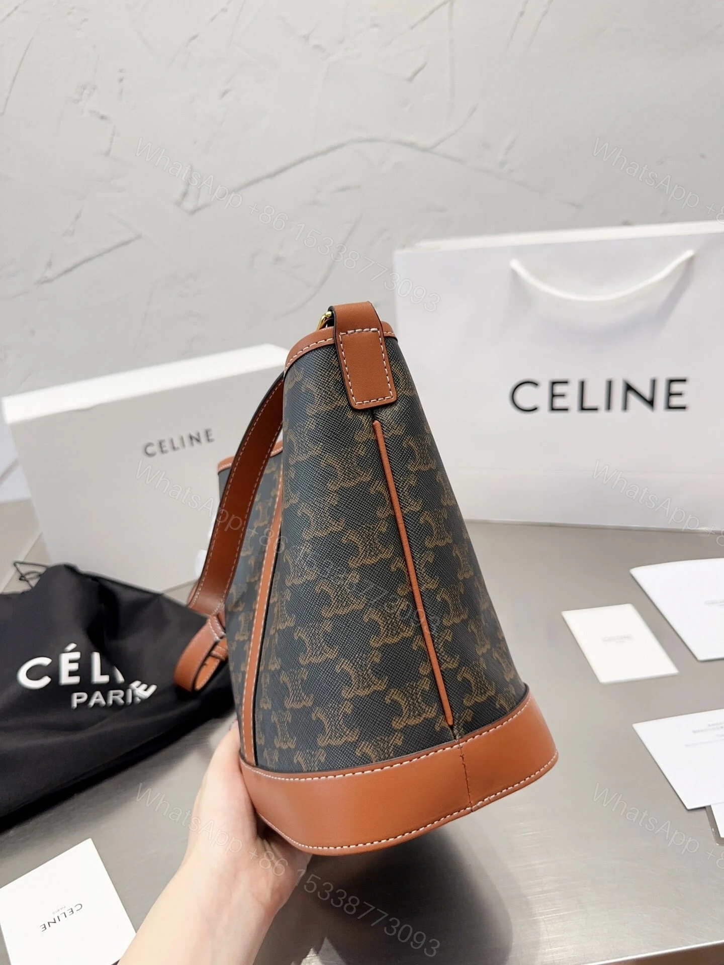 View 4 of CELINE SMALL BUCKET IN TRIOMPHE CANVAS AND CALFSKIN TAN 20CM 191442CAS04LU