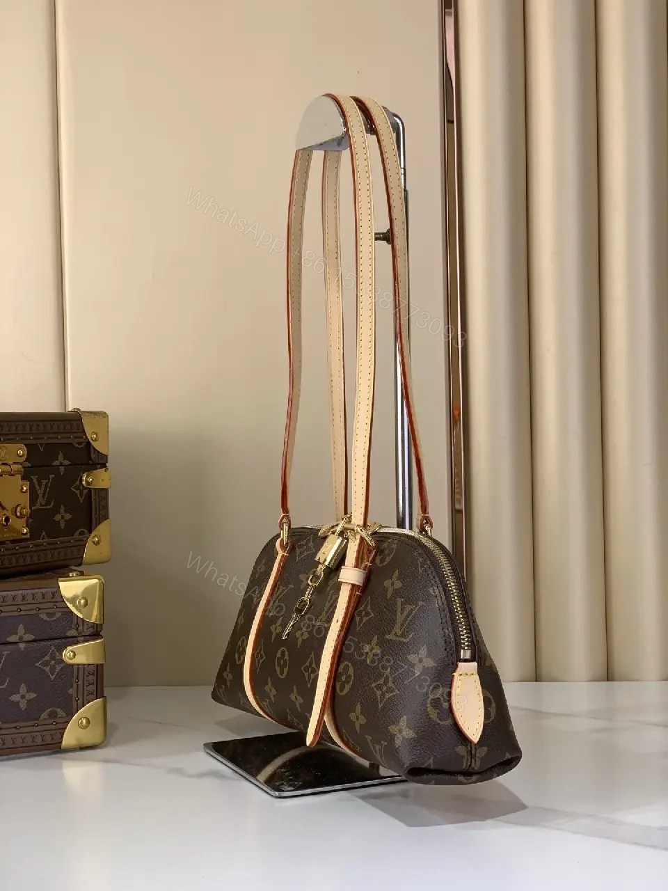 View 8 of Chic Monogram Barrel Bag: Structured, Luxurious Carryall