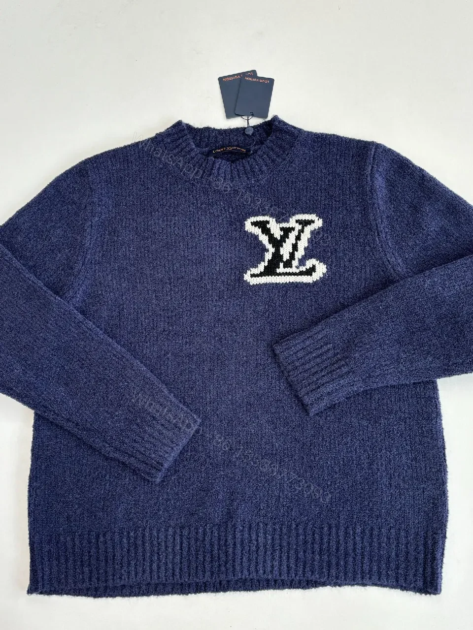 View 4 of Blue Knit Luxury Sweater with Signature Monogram Emblem