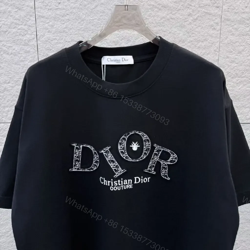View 8 of Bold Luxe Monogram Tee: Black, Oversized Fit, Graphic Statement