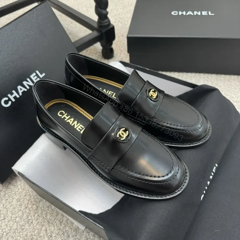 View 4 of Refined Black Leather Loafers with Gold Crest â€“ Luxe Comfort