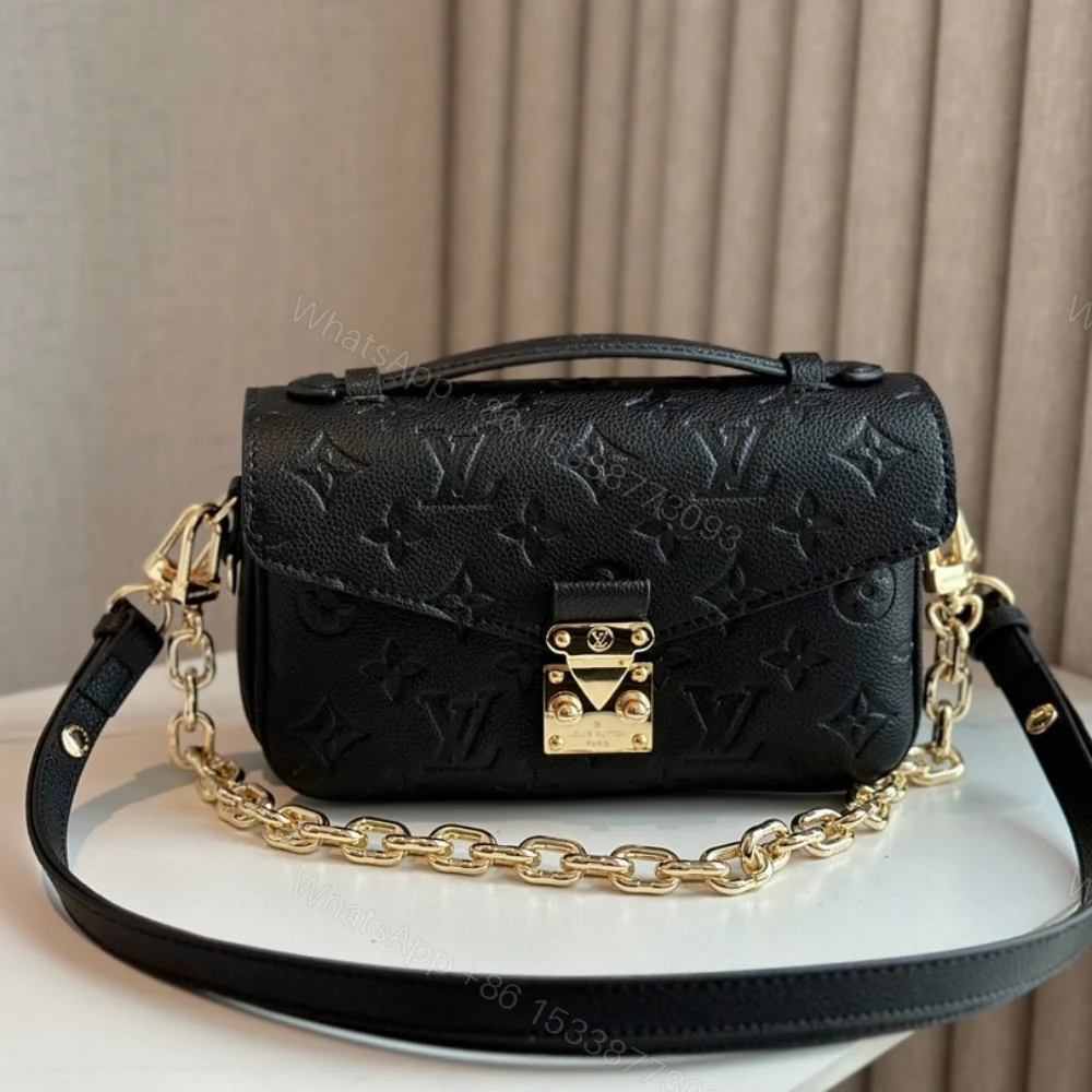 View 2 of Louis Vuitton Pochette Métis East West Bag Black 21Cm M46595