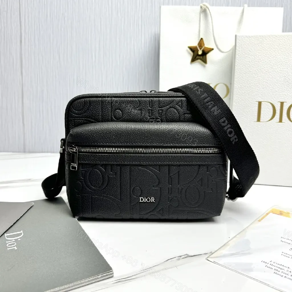 View 3 of Compact Leather Crossbody Bag - Embossed Texture, Luxury Minimalism