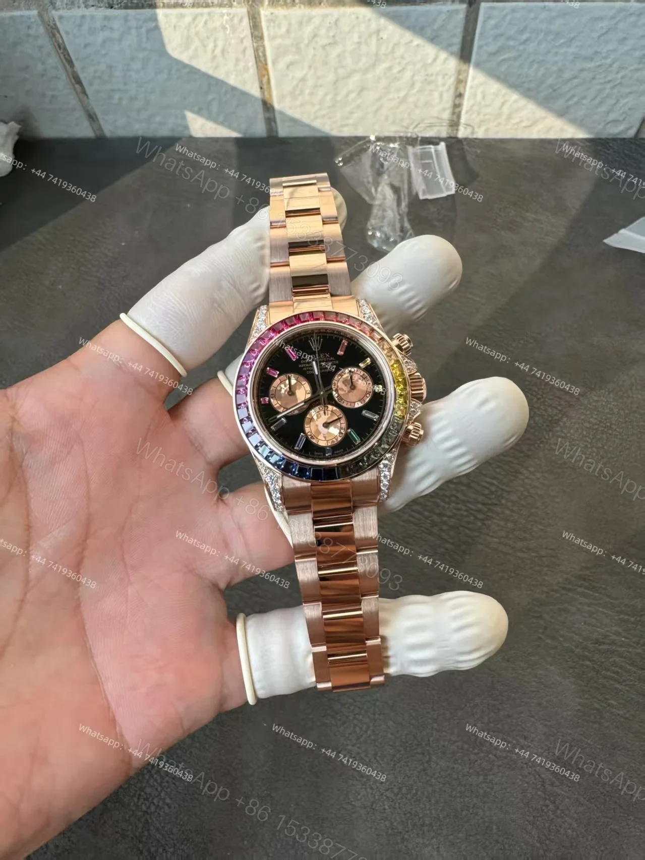 View 27 of Rolex Super Clone Rainbow Daytona 1:1 Replica Watch – 18K Rose Gold