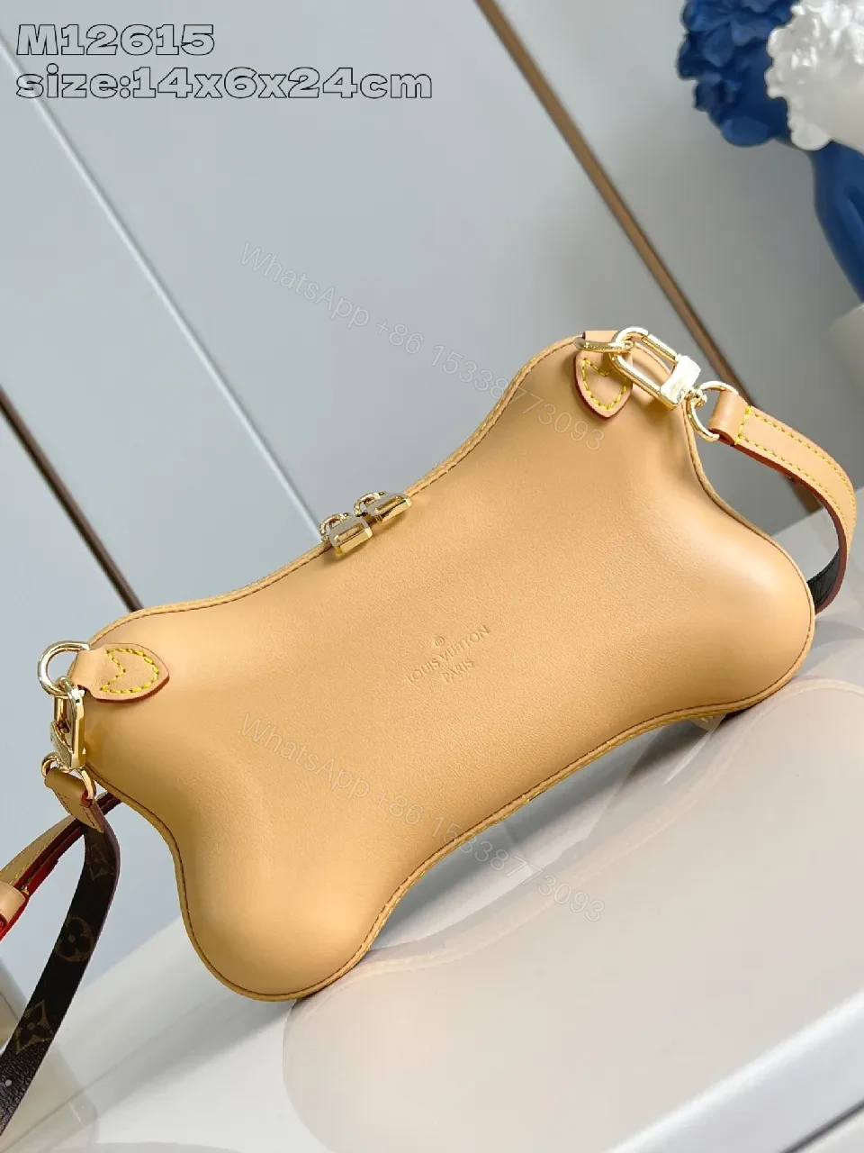 View 4 of Monogram Canvas Bone Bag: Luxe Everyday Chic