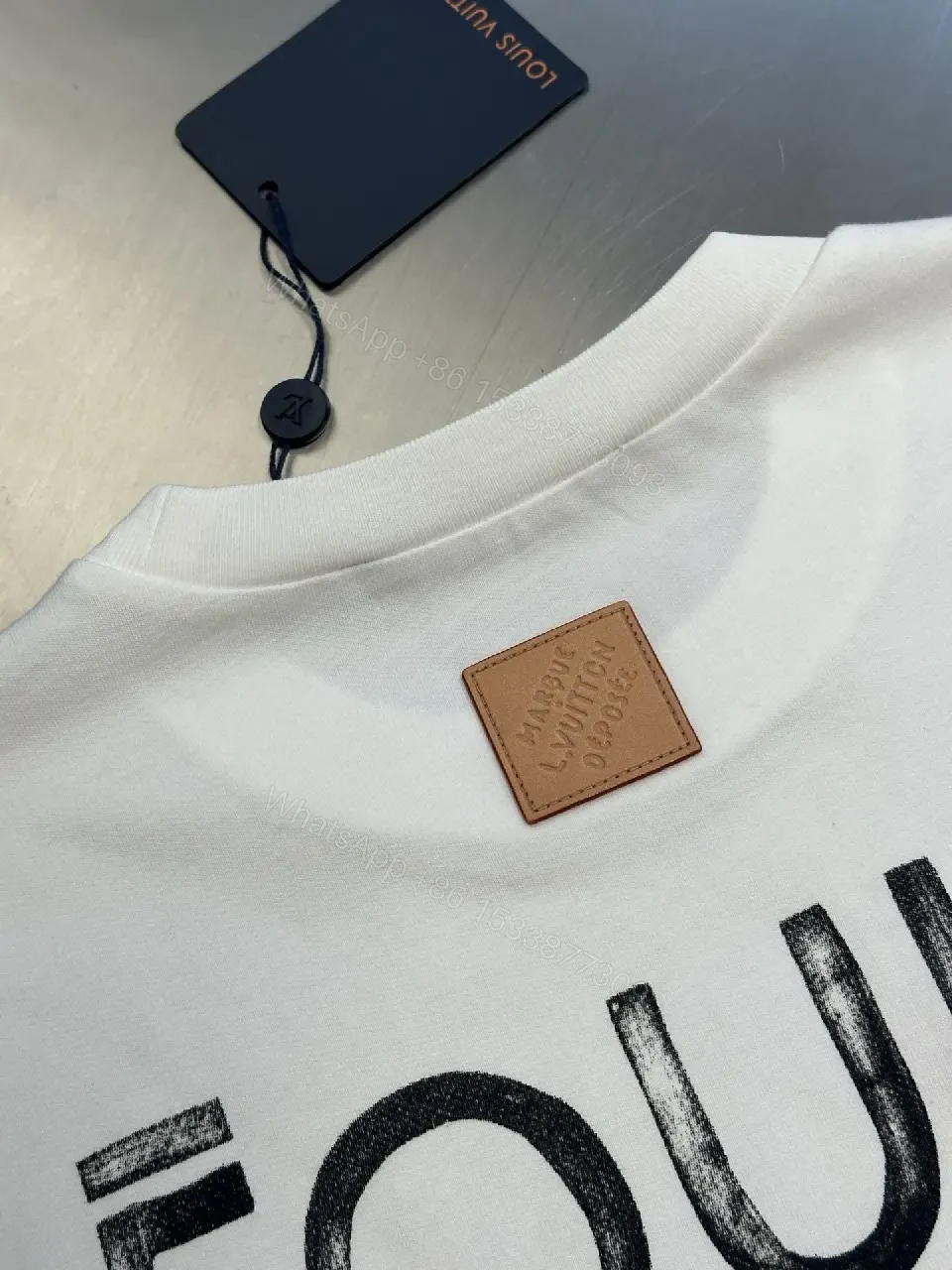View 3 of Minimalist LV.M. Tee: Premium Cotton, Relaxed Fit, White