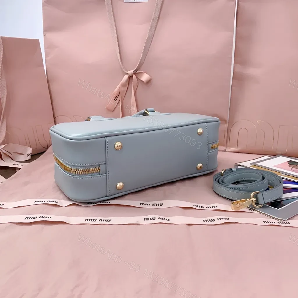 View 6 of Structured Dome Bag: Compact Luxury, Gold Accents, Versatile Style