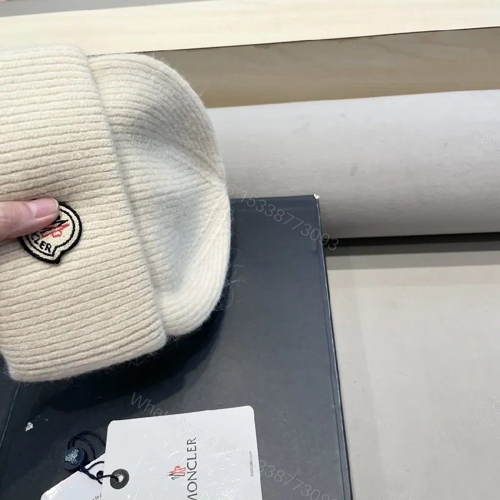 View 6 of Cozy Crest Beanie in Ivory Knit with Subtle Logo Patch