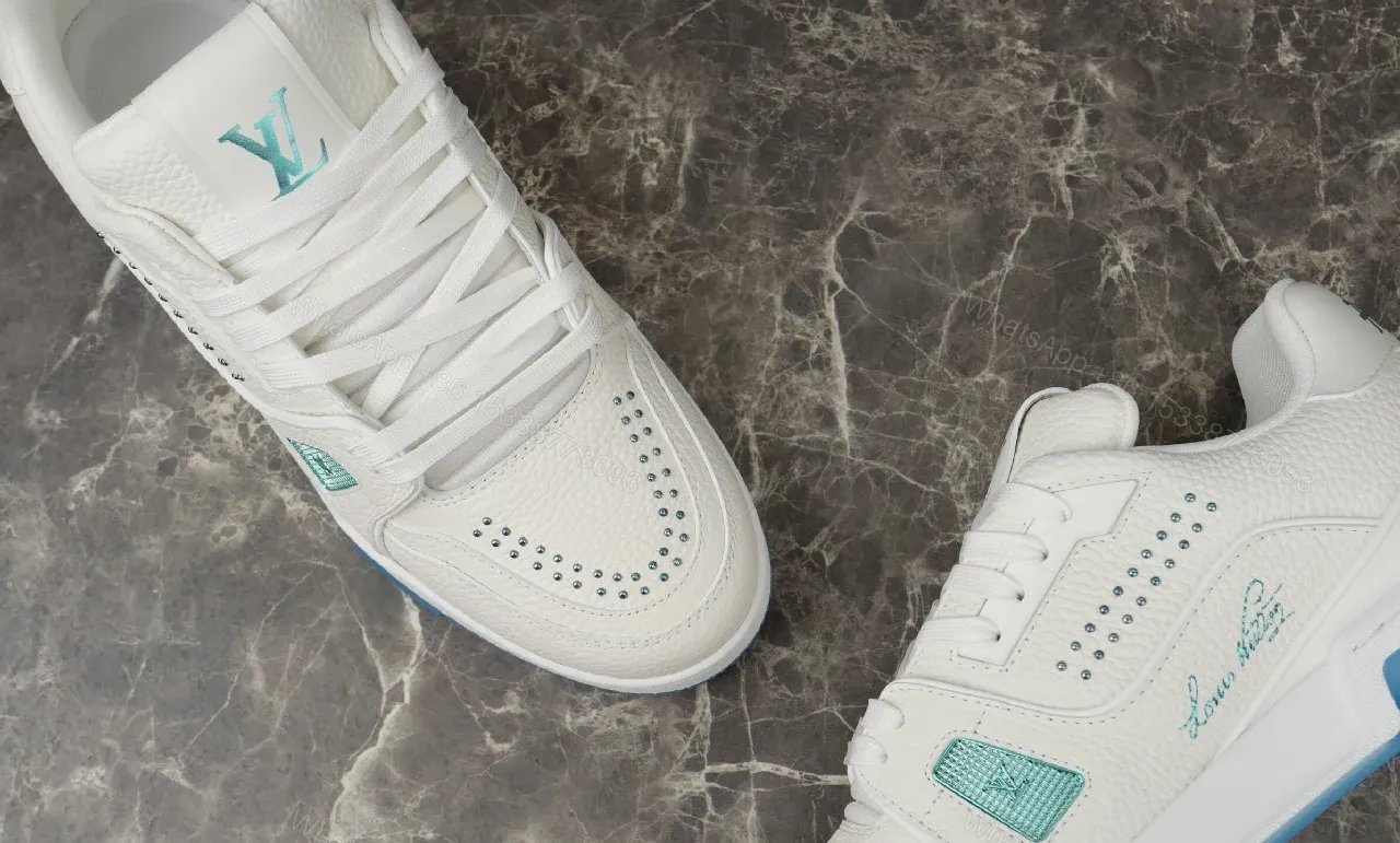 View 9 of White Leather Luxury Sneakers with Subtle LV Accents