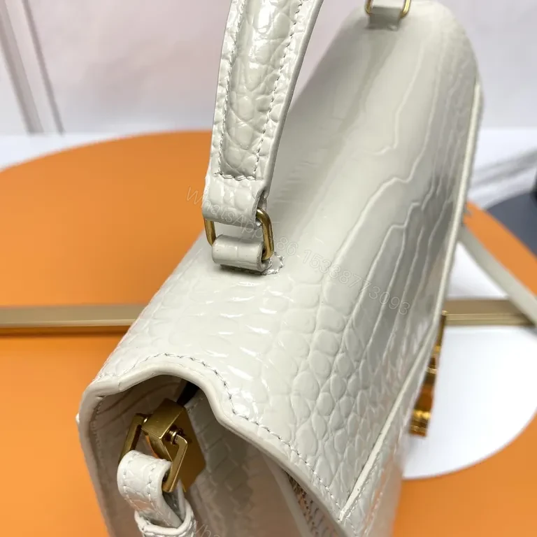 View 2 of Ivory Croc-Embossed Leather Bag with Gold YSL Logo, Structured Style