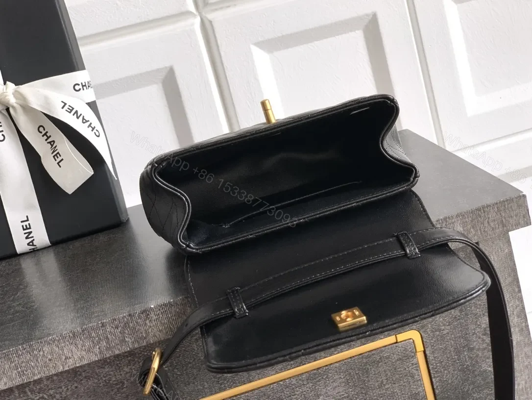 View 9 of Compact Quilted Black Camera Bag with Gold Hardware
