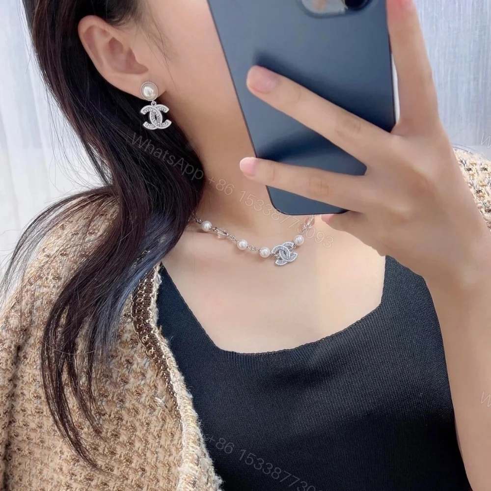 View 5 of CHANEL DOUBLE C PEARL EARRINGS SILVER WHITE