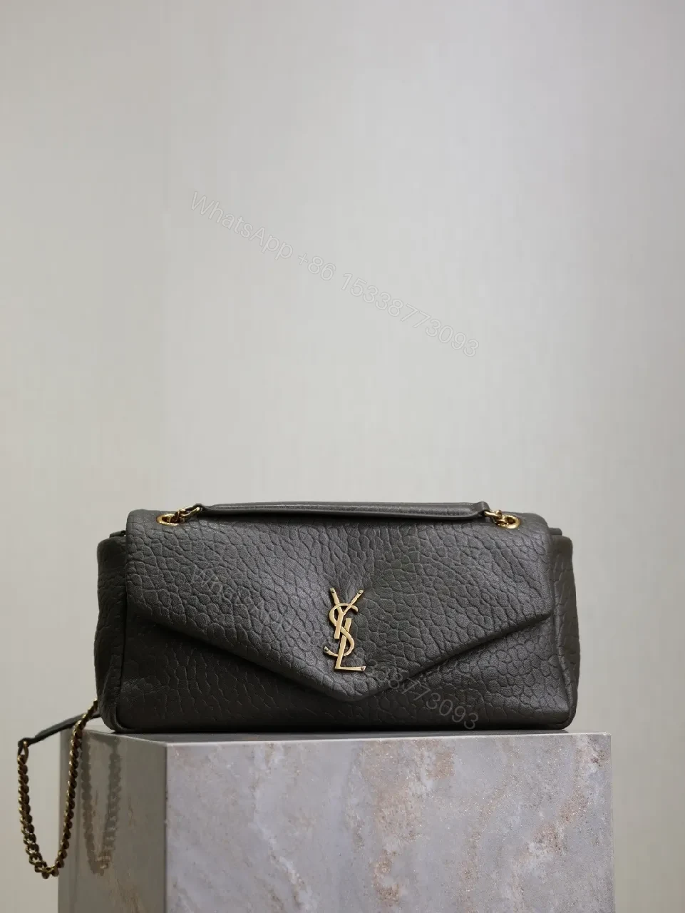 Textured Leather Envelope Bag: Black + Gold Accent, Compact Luxury Shoulder Bag — view 1