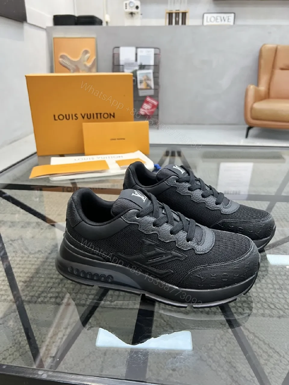 View 2 of Black Leather-Textured Runner with Signature Detailing Sneakers