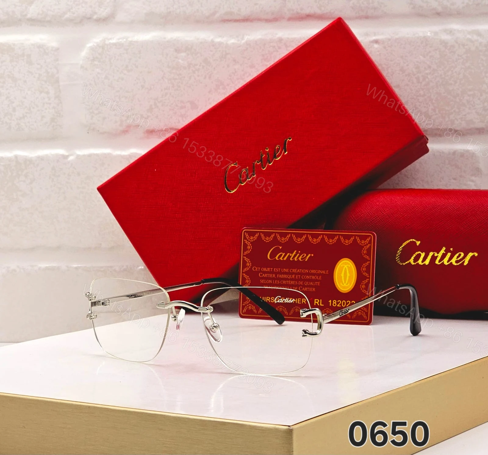 View 2 of Cartier 0650 Rectangular Rimless Sunglasses Black & Gold