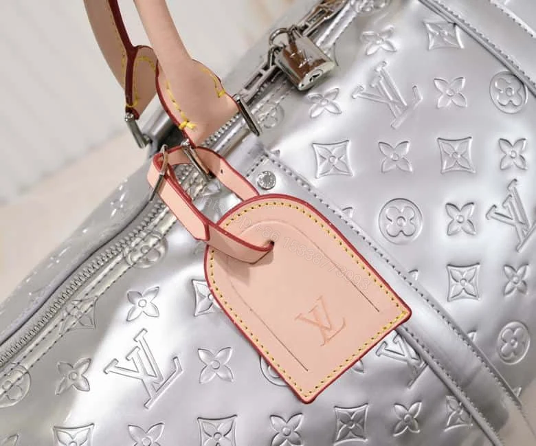 View 9 of LOUIS VUITTON KEEPALL BANDOULIERE 50 SILVER